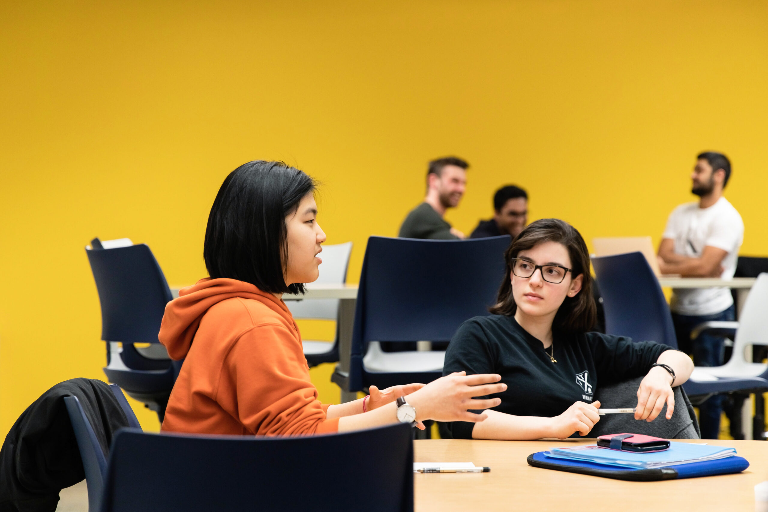 Undergraduate students collaborating in the classroom
